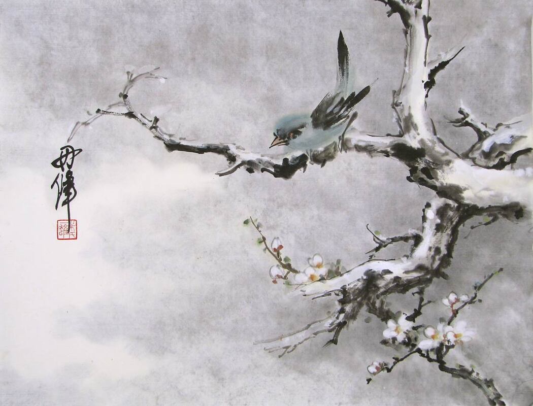 green bird on white plum branch in snow