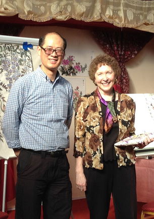 Picture of Virginia & artist William Cai after demonstrating in London, England