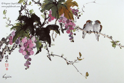 Two sparrows sitting on a purple grape vine