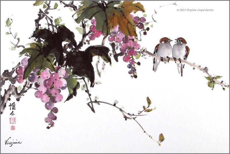 Two sparrows sitting on a grapevine