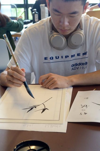 Picture of Japanese student with brush
