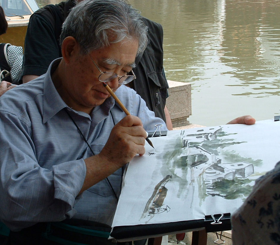 artist I-Hsiung Ju sketching water scene in Chinae
