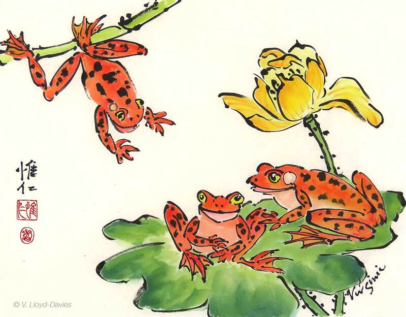 3 orange frogs, yellow lotus flower, green leaf